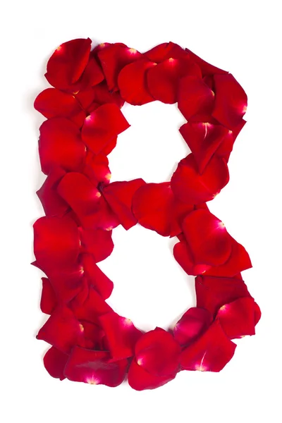 Buchstabe b aus roten Blütenblättern Rose auf weiß — Stockfoto