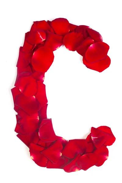 Letter C made from red petals rose on white — Stock Photo, Image