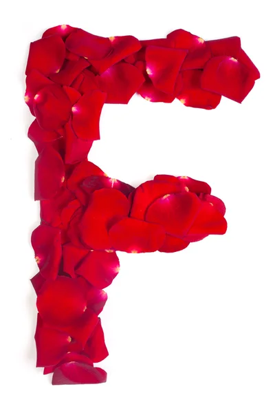 stock image Letter F made from red petals rose on white