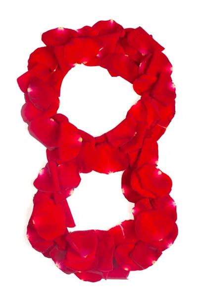 Number 8 made from red petals rose on white — Stock Photo, Image