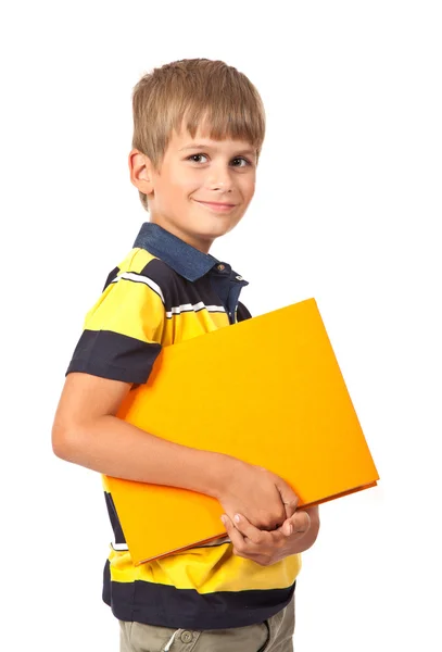 Szkole chłopiec trzyma książkę — Zdjęcie stockowe