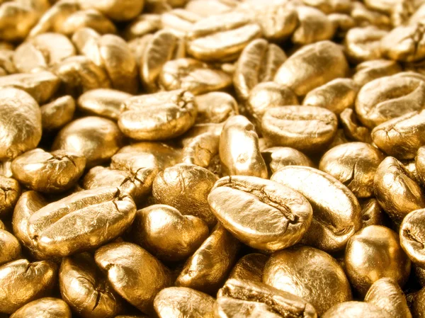 Káva zlato detailní pozadí. — Stock fotografie