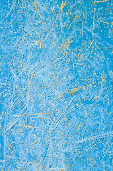 Blue woodchip board close seup background . — стоковое фото