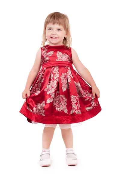 Lilla vackra flicka i mode klänning — Stockfoto