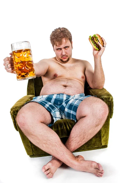 Şişman adam yeme hamburger — Stok fotoğraf