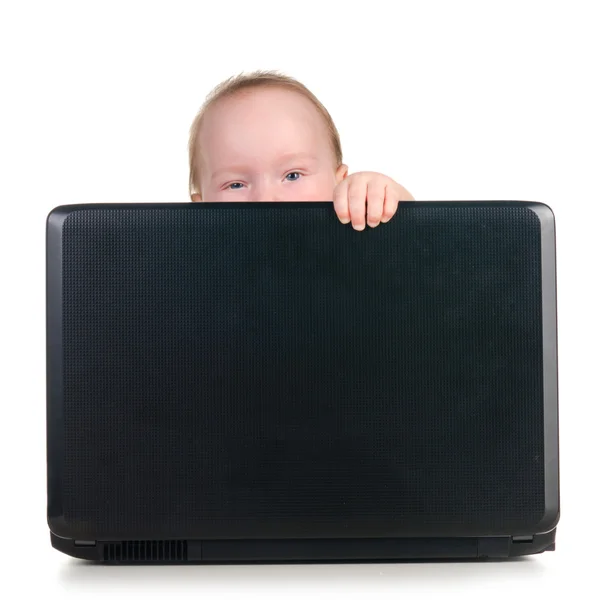 Baby is working on laptop — Stock Photo, Image