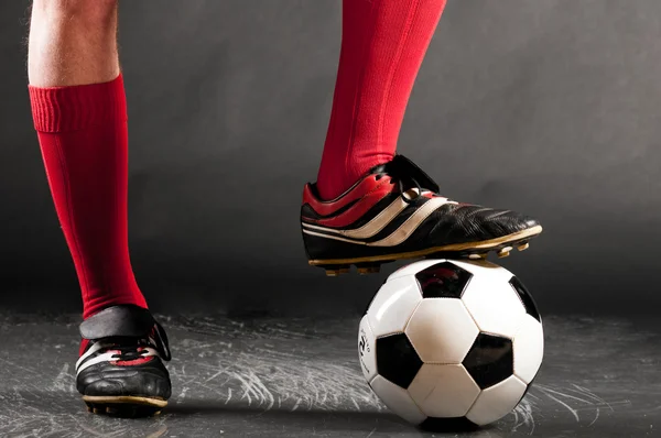 Legs of soccer player — Stock Photo, Image