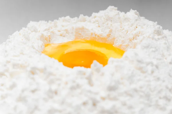 Egg in flour — Stock Photo, Image