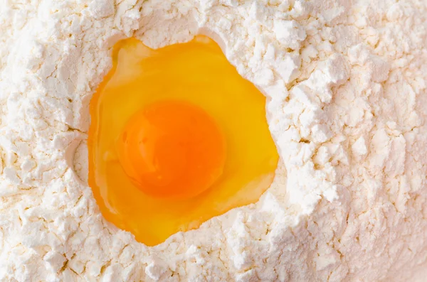 Egg in flour — Stock Photo, Image