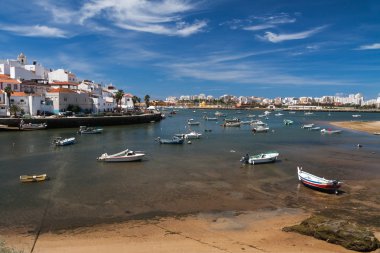 Fishing boats in Ferragudo harbor, Algarve. Portugal clipart