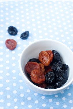 Dried fruits - prunes and arpicots clipart