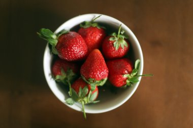 Strawberries In White Ceramic Bowl clipart