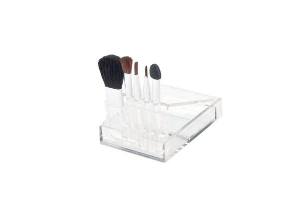 Set de pinceles para maquillaje en una caja transparente — Foto de Stock