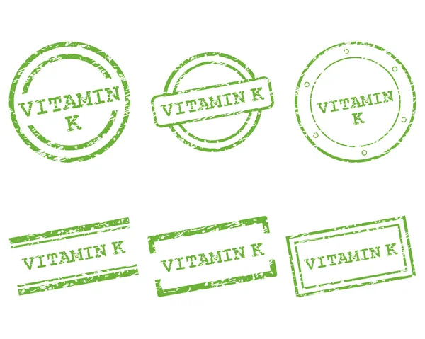 Vitamin K stamps — Stock Vector