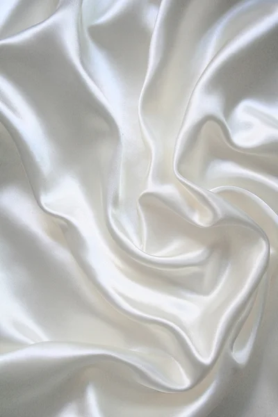 滑らかなエレガントな白い絹は結婚式の背景として使用できます — ストック写真