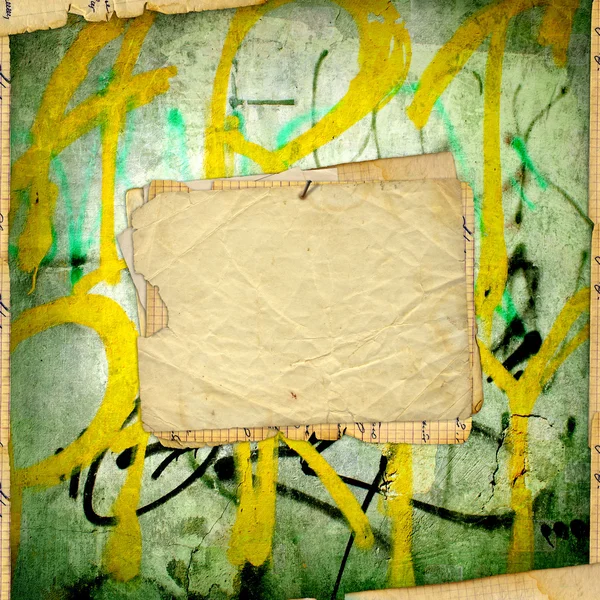Gamla grunge paper på gamla graffiti väggen — Stockfoto
