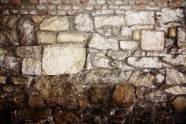 stock image The background of the old masonry with traces of the former migh