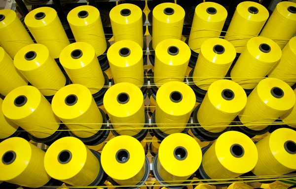 stock image Coils of yellow threads