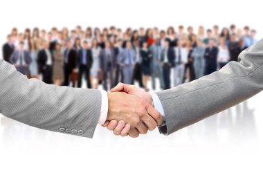 Shaking hands and business team clipart