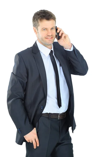 Portrét muže podnikání s telefonem izolovaných na bílém poz — Stock fotografie