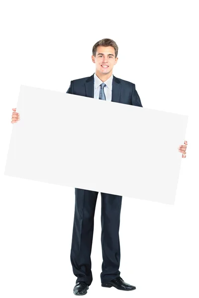 幸せな笑顔若いビジネス男空白の看板を示す — ストック写真