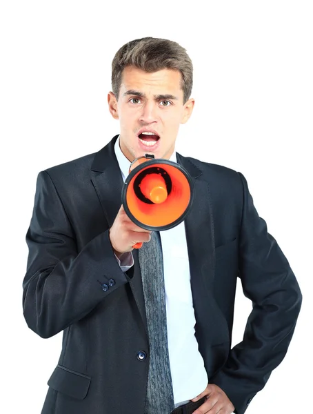 Homem de negócios gritando alto em um megafone — Fotografia de Stock