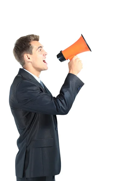 Homem de negócios gritando alto em um megafone — Fotografia de Stock
