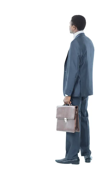Africano americano homem de negócios de trás olhando para algo isolado fundo branco — Fotografia de Stock
