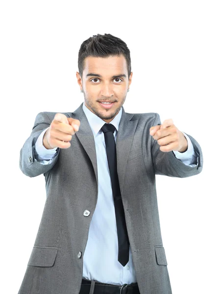 Young businessman pointing with both hands at you against on white background — Stock Photo, Image