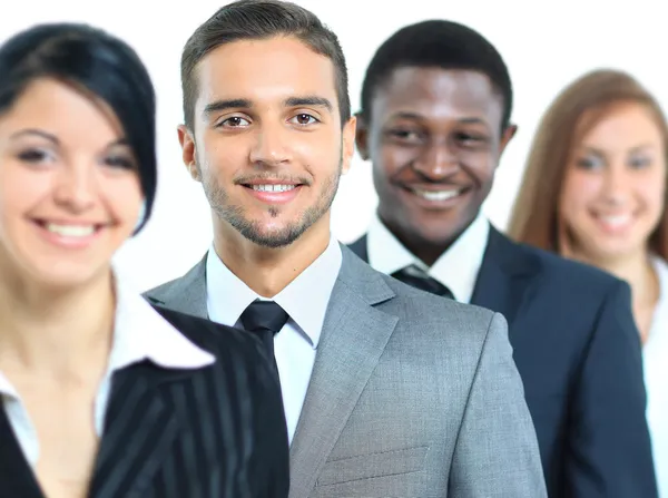 Happy smiling business team standing in a row Stock Image