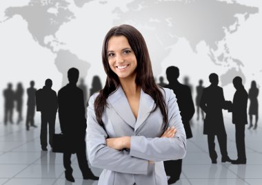 Happy young business woman standing in front of her team clipart