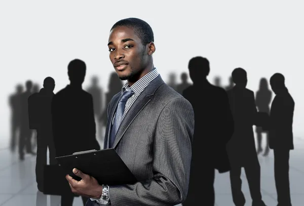 Afro-American businessman with his team — Stock Photo, Image