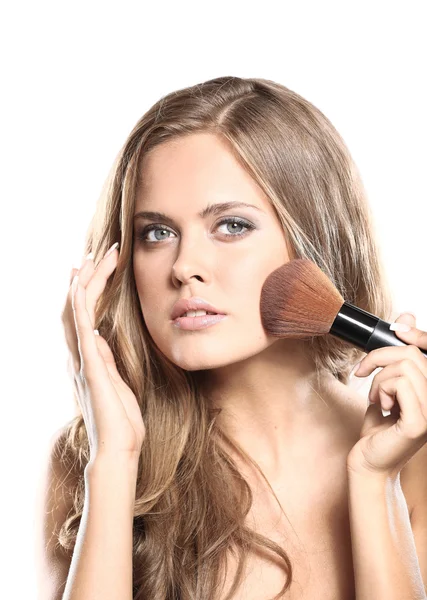 Beautiful woman with makeup brushe — Stock Photo, Image