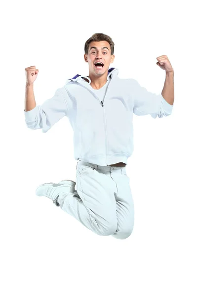 Springen jonge man. geïsoleerd op witte achtergrond — Stockfoto