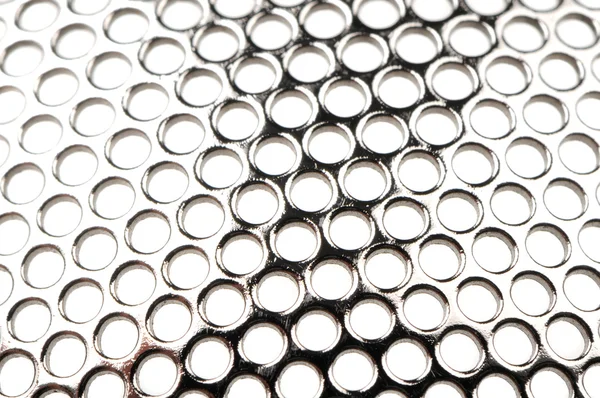 Metalen raster met ronde cellen — Stockfoto