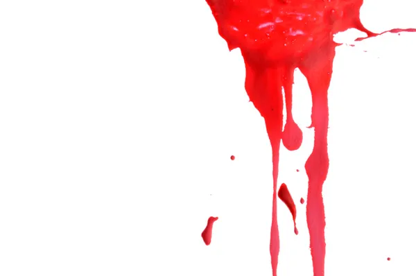 Rote Farbe tropft auf weißem Hintergrund herunter — Stockfoto