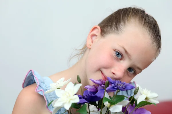 Portrait of beautiful girl with flower — Stock Photo, Image