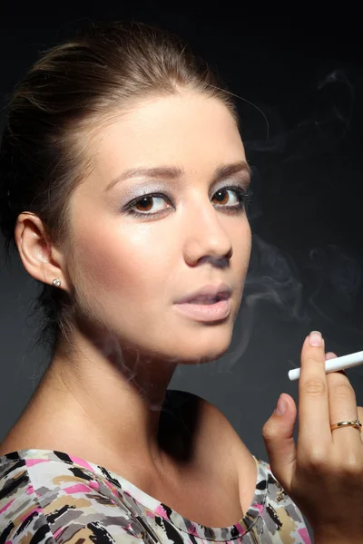 stock image Portrait of a girl in tobacco smoke