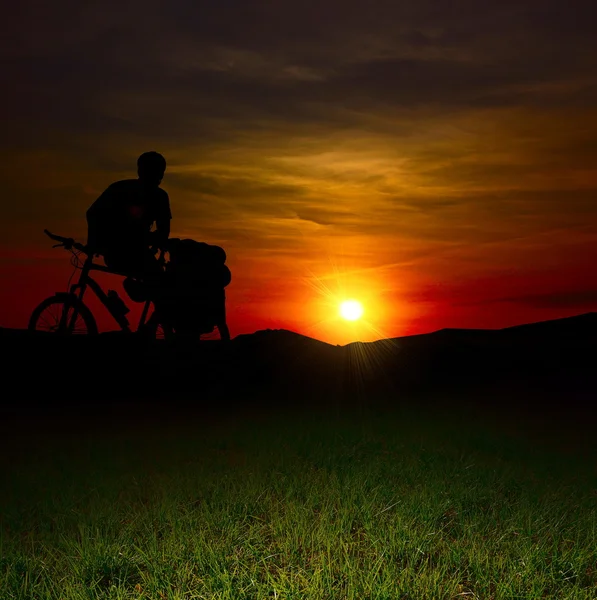 stock image Silhoette of a biker in the evening