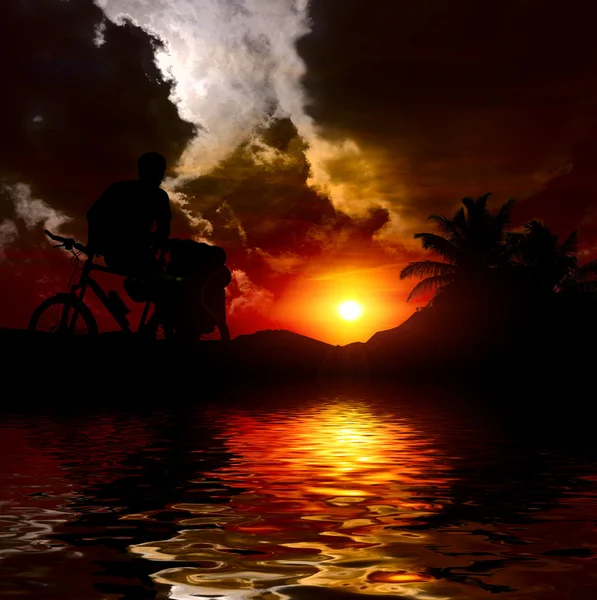 stock image Silhoette of a biker in the evening