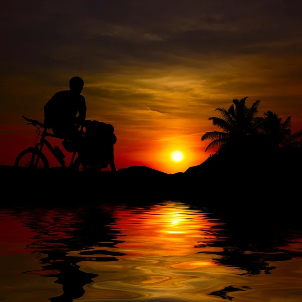 Stock image Silhoette of a biker in the evening