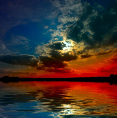 Lake at the sunset clipart