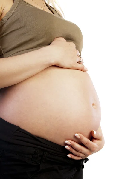 孕妇爱抚她的肚子 — 图库照片