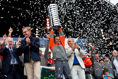 Franck Cammas with the Volvo Ocean Race trophy clipart