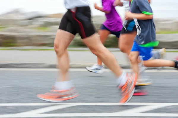 Běžci, rozmazaný pohyb — Stock fotografie