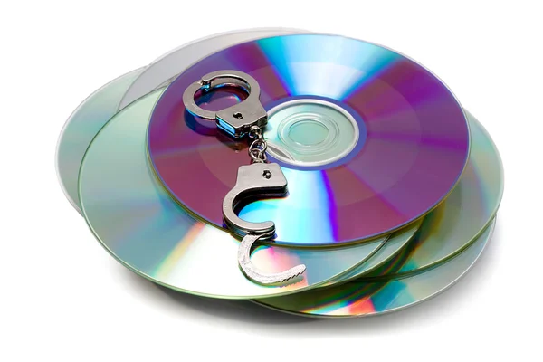 Kelepçeler yığında CD — Stok fotoğraf