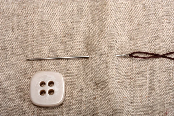 Button needle and thread — Stock Photo, Image