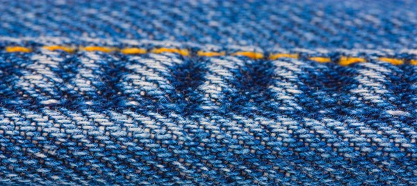 Linka švadlena modré džíny — Stock fotografie
