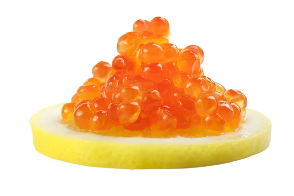 Red caviar in lemon — Stock Photo, Image