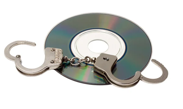 Handcuffs on software — Stock Photo, Image